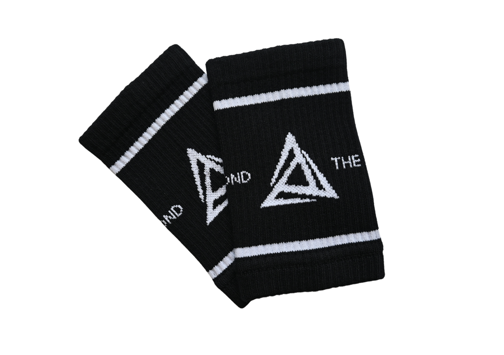 Black fitness wrist sweatband with white logo and text