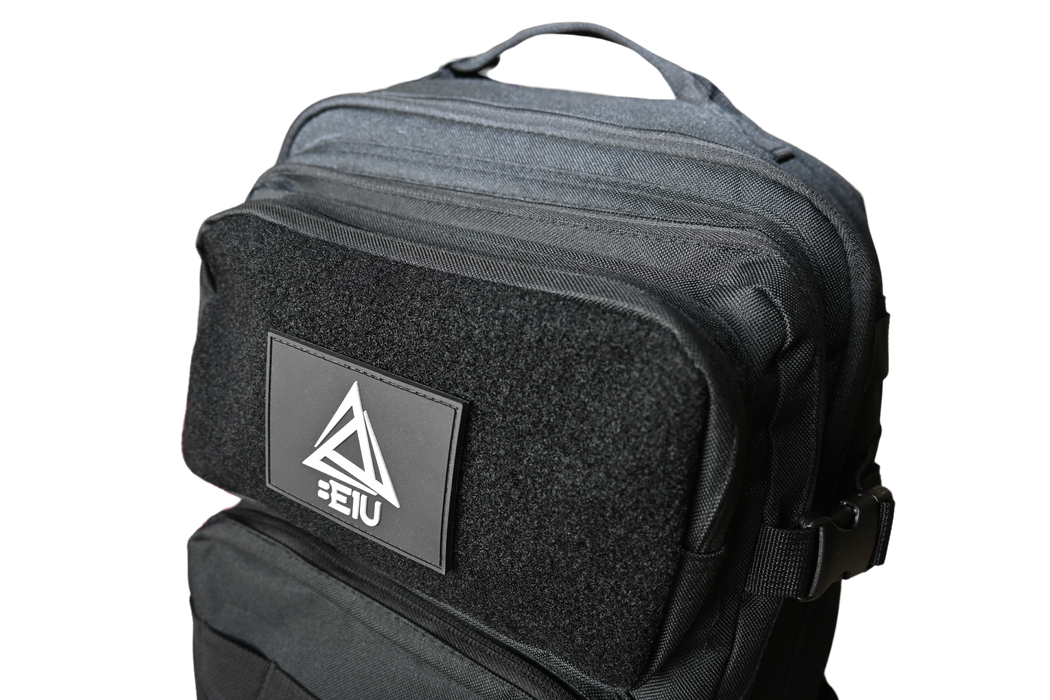 BE1U black backpack with velcro patch pocket view
