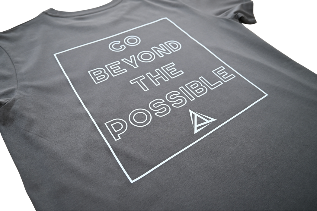 Grey tshirt rear side view with Go Beyond The Possible text and BE1U logo in white