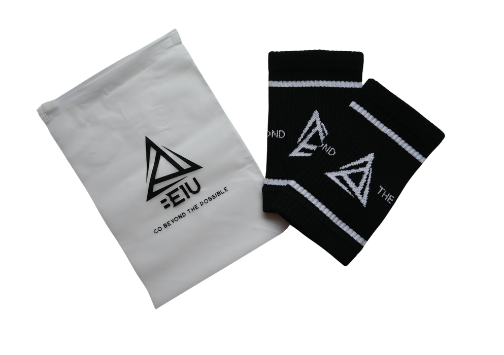 Black fitness wrist sweatband with white logo and text and storage bag